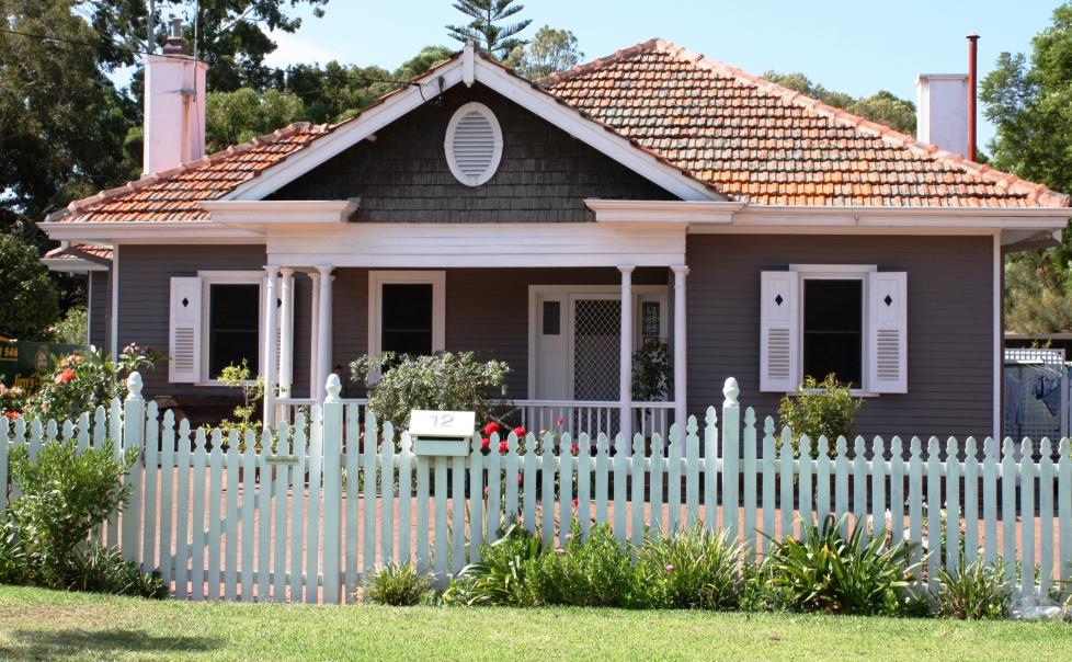 simple house with a lower fence