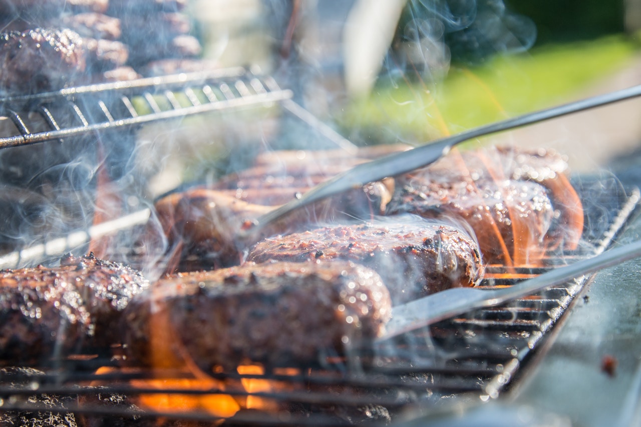 beef patties grilled outdoors